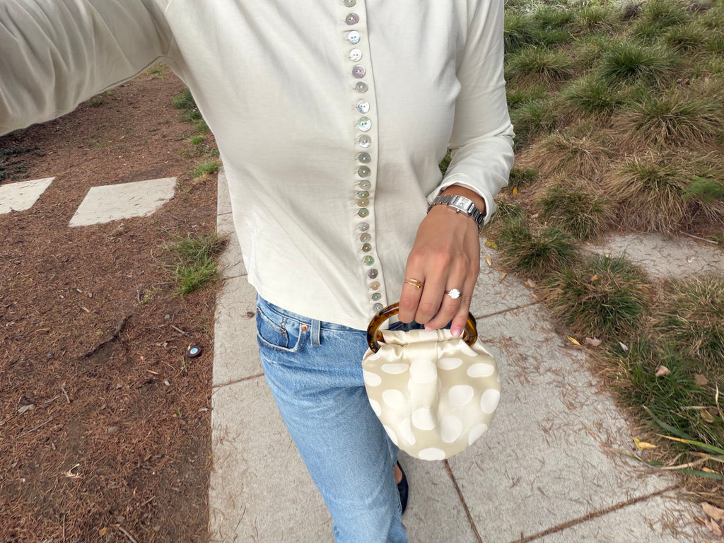The Dottie Bag in ivory tonal polka dots by Du Motra