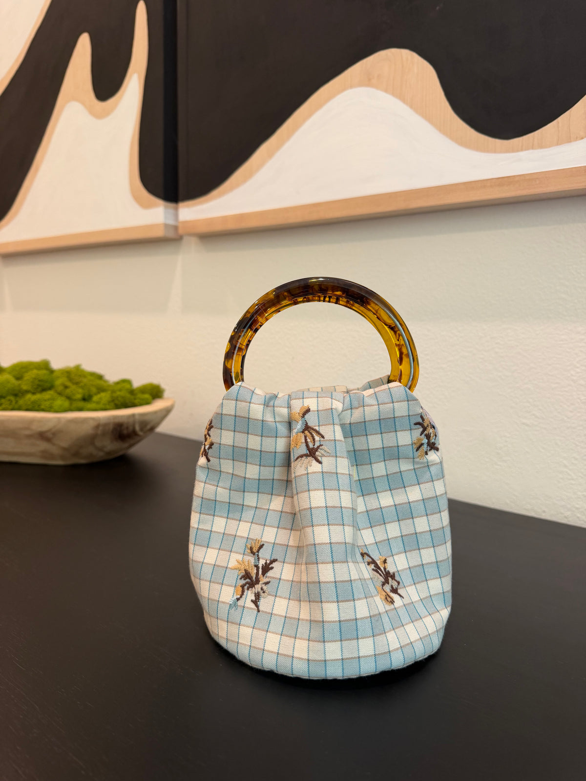 The Gingham Bag in light blue embroidered gingham with tortoiseshell handles, handmade in Los Angeles by Du Motra