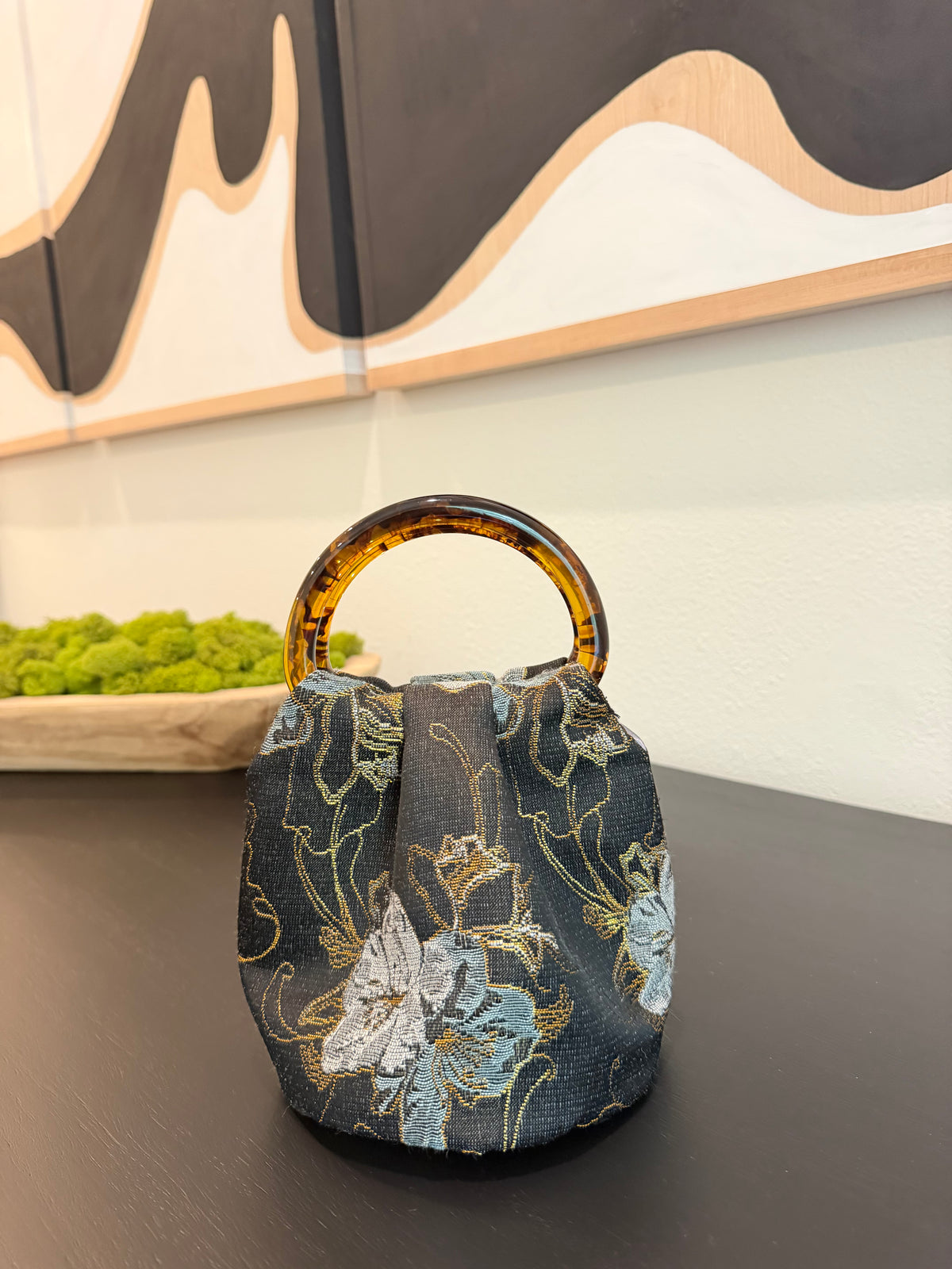 The Indigo Bag in indigo floral jacquard with tortoiseshell handles, handmade in Los Angeles by Du Motra