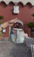 The Ischia Bag in feathered marble linen with tortoiseshell handles, handmade in Los Angeles by Du Motra